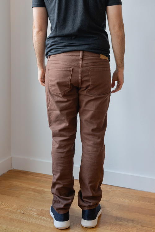 Man wearing tan pants from Mott & Bow
