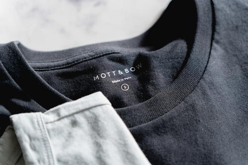 Close up of a black Mott & Bow t-shirt