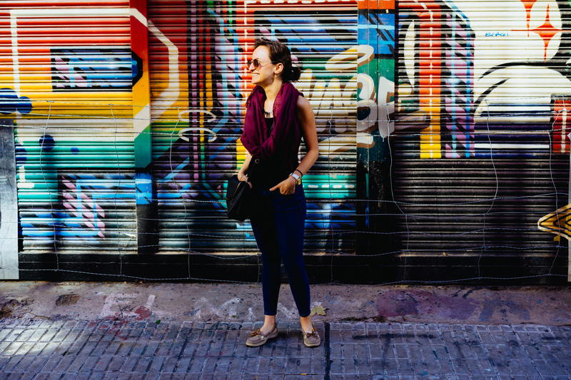 Woman standing with street art in Palermo Soho Buenos Aires Argentina