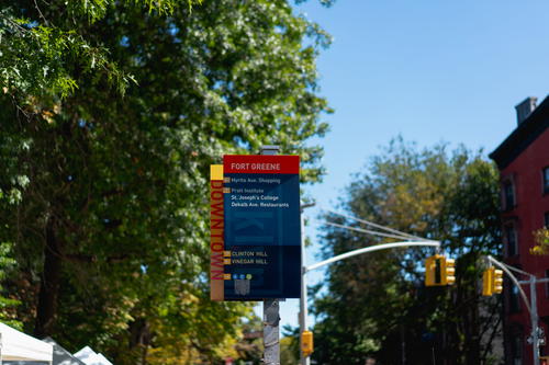 A street sign on a pole.