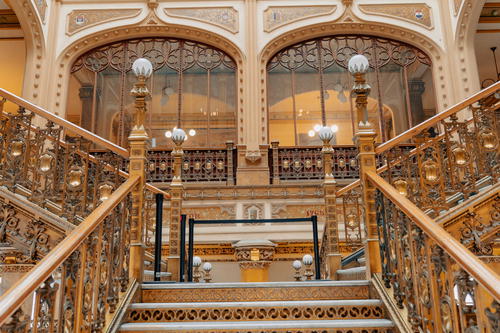 An ornate staircase in a building.