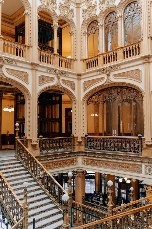 An ornate staircase in a building.