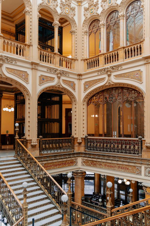 An ornate staircase in a building.