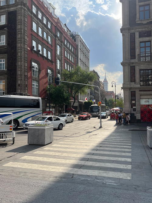 A bus is parked on a street in mexico city.