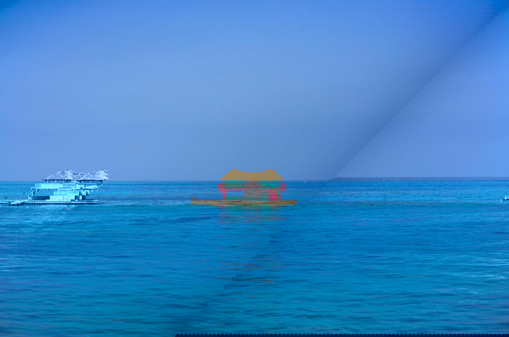 Bright blue sky and blue water off the north coast of Cartagena, Colombia