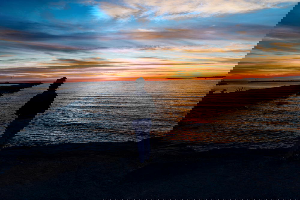 Girl looking at sunset