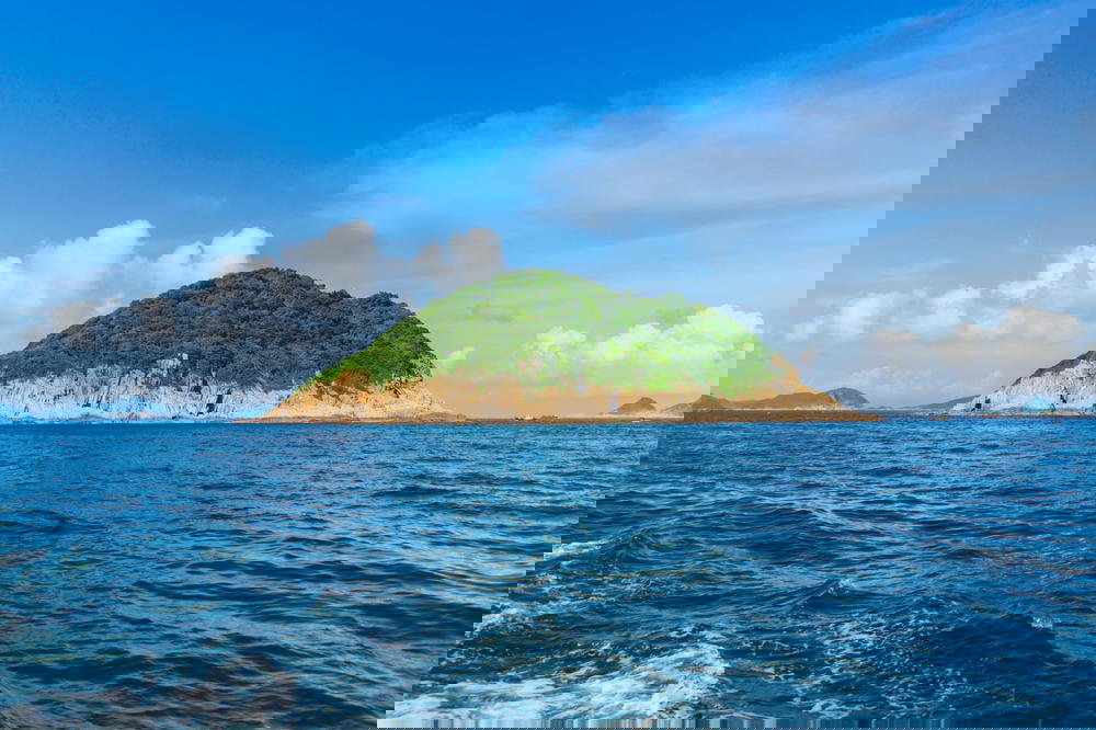 Small island in the distance from a boat in Hong Kong
