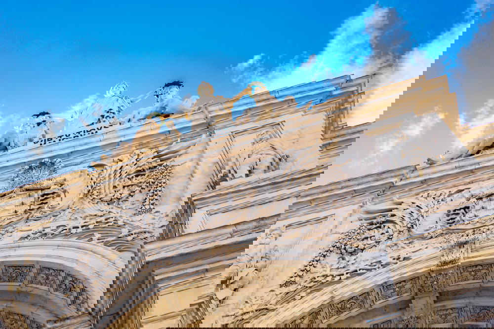 Famous white stone archway at Praca do Comercio in downtown Lisbon
