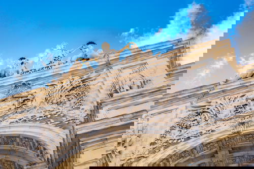 Famous white stone archway at Praca do Comercio in downtown Lisbon