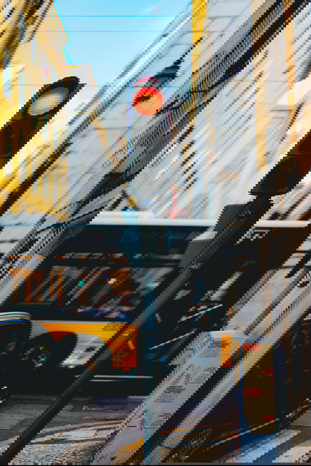 Old fashioned stoplight in a picturesque downtown Lisbon neighborhood