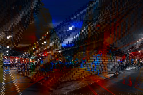 Street lights line a downtown main street in Baixa Lisbon