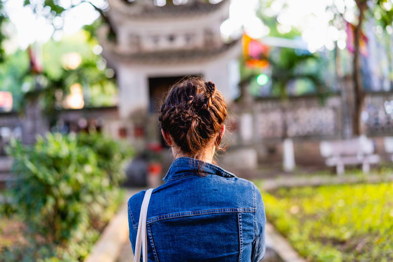 Woman at Quan Thanh Temple (Buddhist temple in Hanoi)