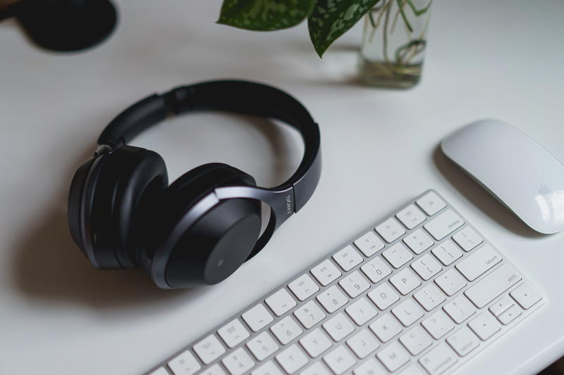 Sony bluetooth headphones use in a home office setup with an apple magic keyboard and apple wireless mouse