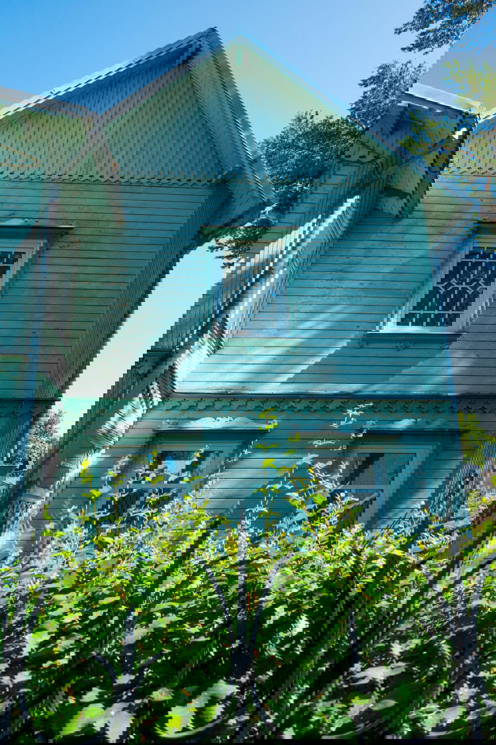 Pastel colored Victorian sided house in Jurmala
