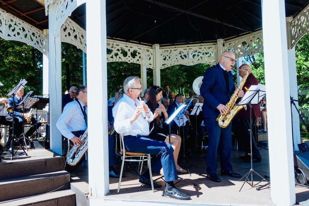 Latvian brass band playing in a gazebo