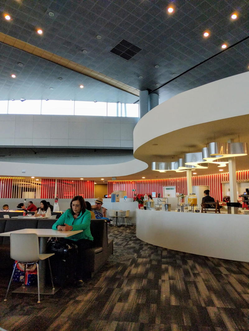 A circular ceiling in the middle of the room.