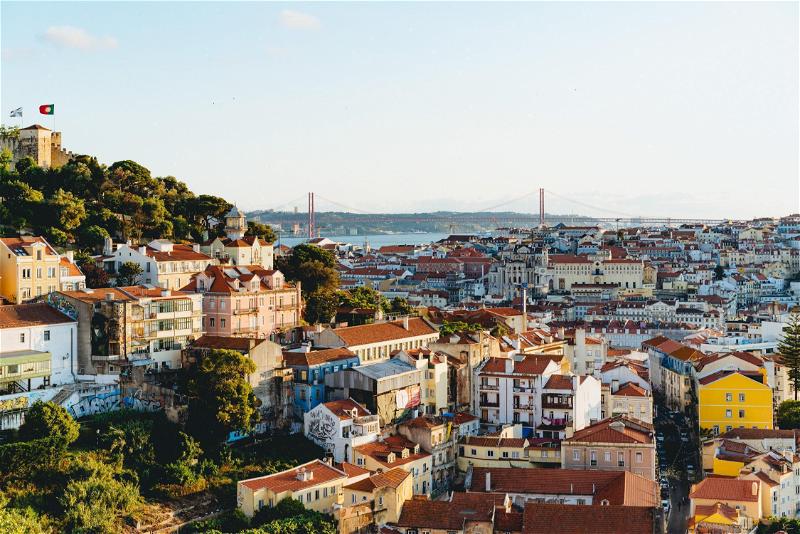 A view of the city of lisbon from the top of a hill.
