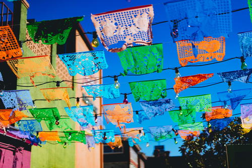 Mexican style flags strung across a walkway in San Antonio Texas