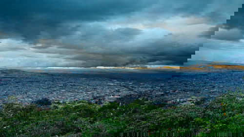 A cloudy sky over the city of bogota, colombia.