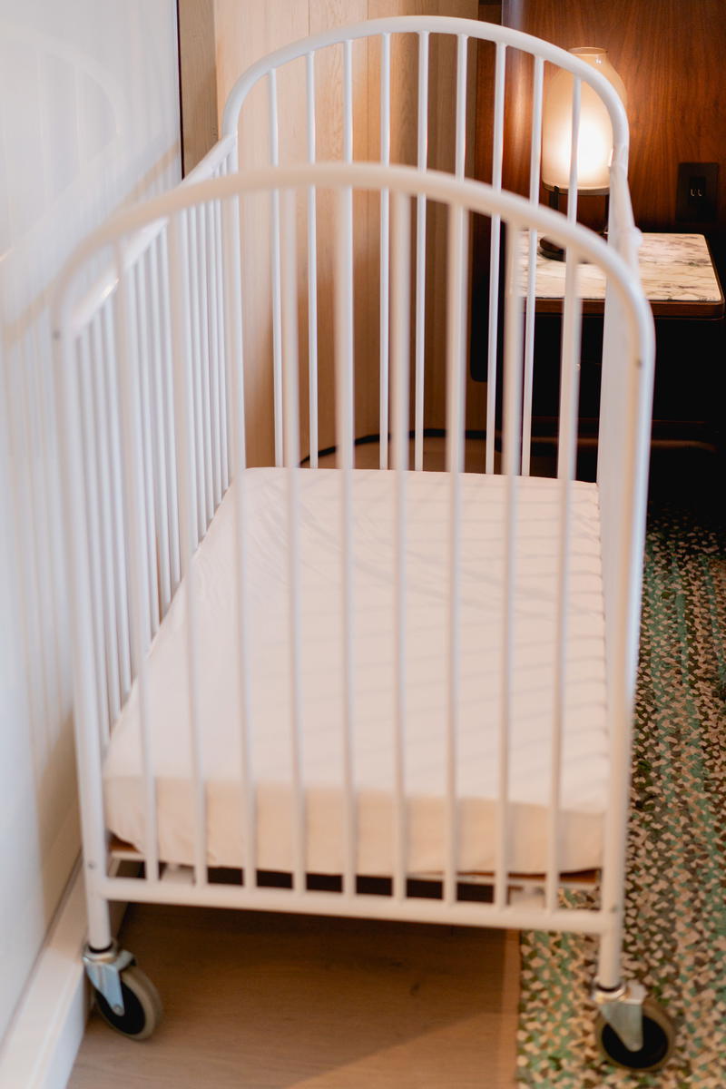 A white crib in the Muir Hotel in Halifax.