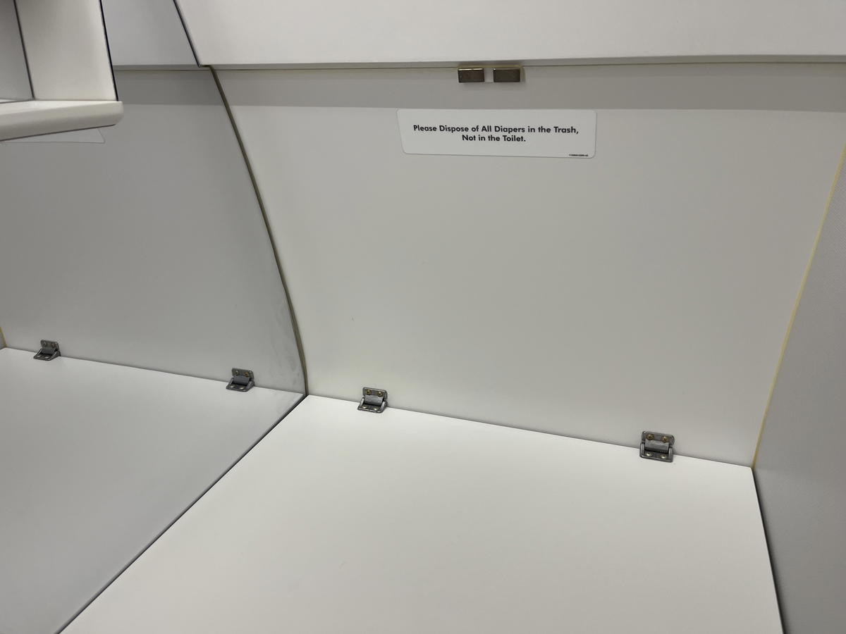 The Best Way to Change a Diaper on an Airplane (and a Simple Trick)