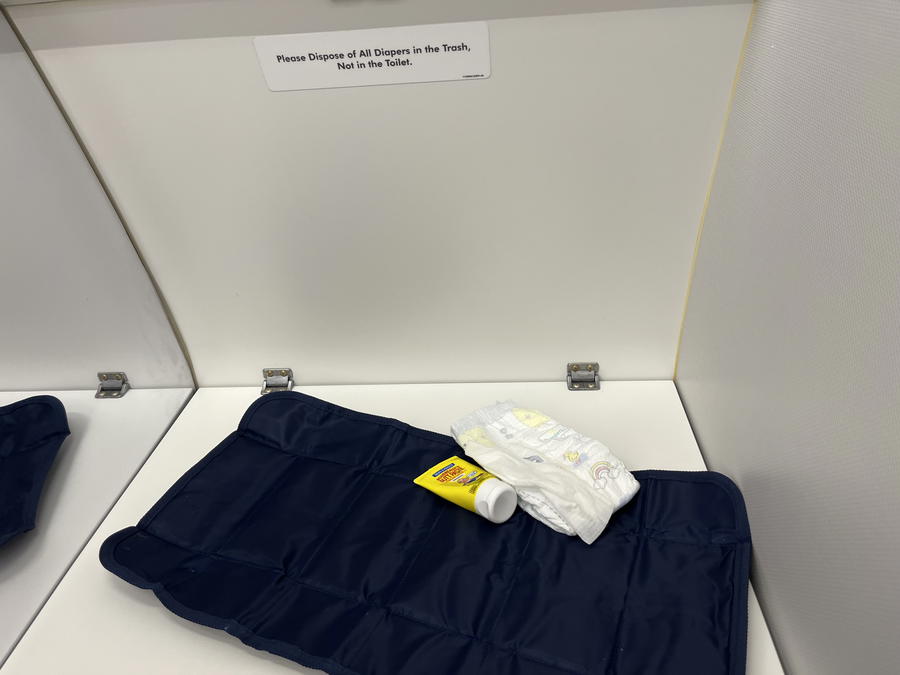 The Best Way to Change a Diaper on an Airplane (and a Simple Trick)