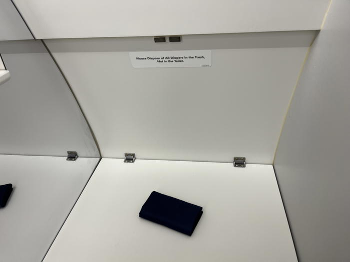 The Best Way to Change a Diaper on an Airplane (and a Simple Trick)