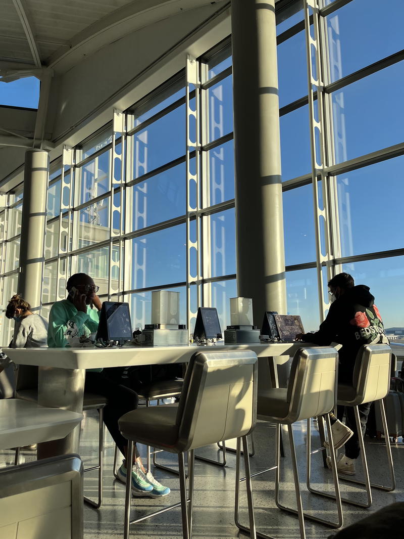 A group of people sitting at a table.