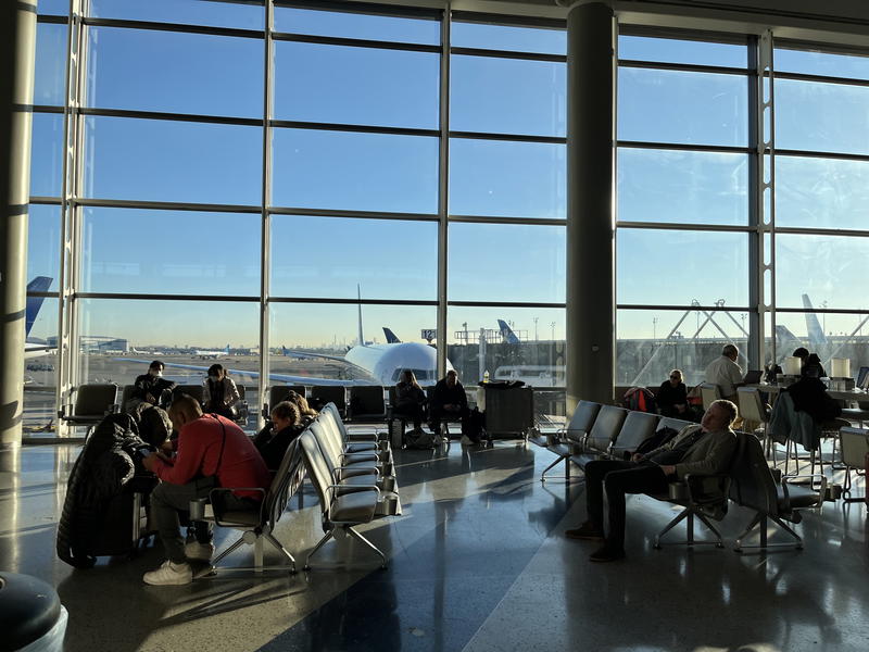 A group of people at an airport.