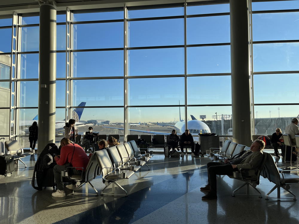 A group of people at an airport.