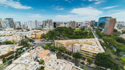 Wide angle view of street diagonals and residential apartment buildings from a rooftop