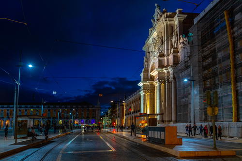 Street lights light up a dark main road near Praca do Comercio Lisbon