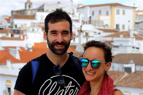 Man and women smiling for a photo in Evora, Portugal
