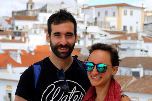 Man and women smiling for a photo in Evora, Portugal