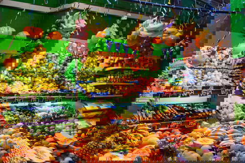 A display of fruits and vegetables in a store.