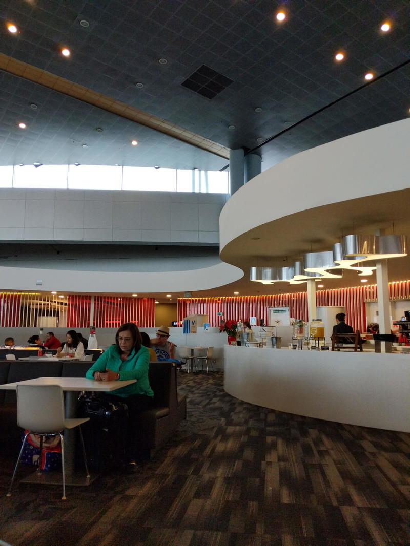 A circular ceiling in the middle of the room.