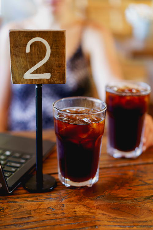 Two cold brews on a table at Vagamundo in Cabarete