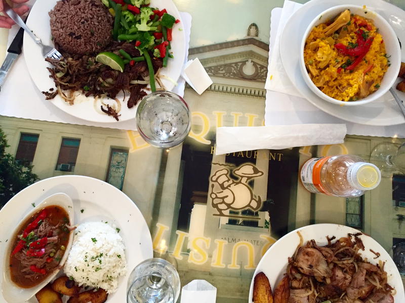 A plate of food on a table in a restaurant.