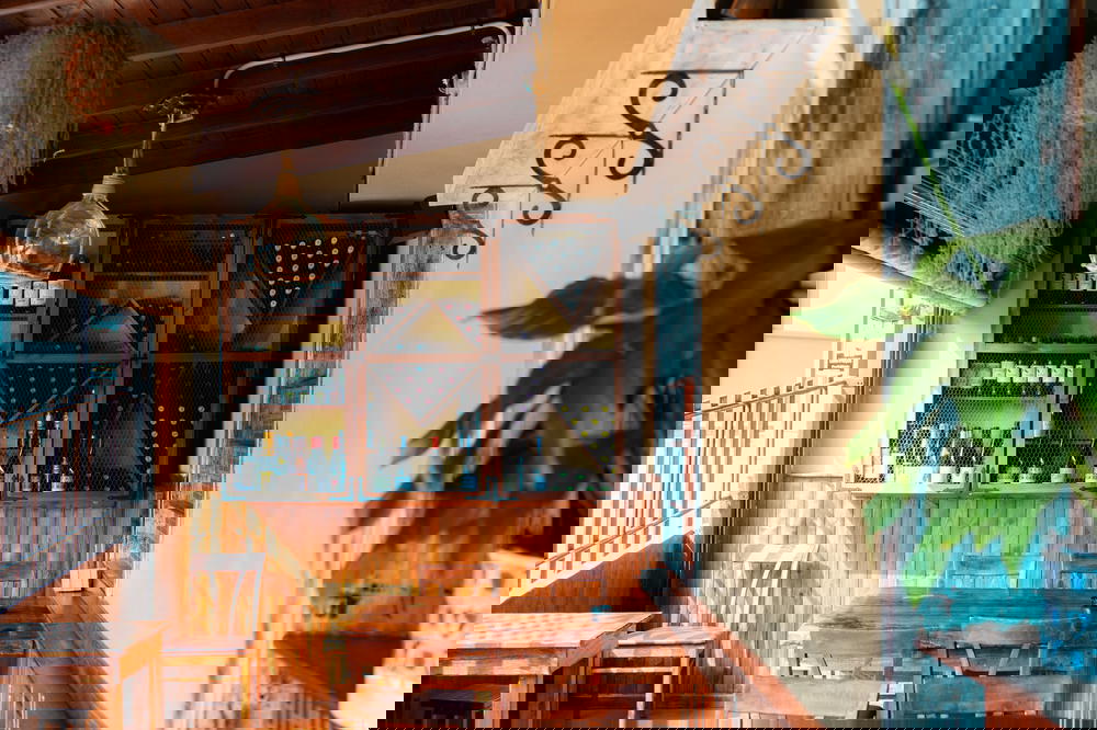 Wooden touches on outdoor seating at a patio