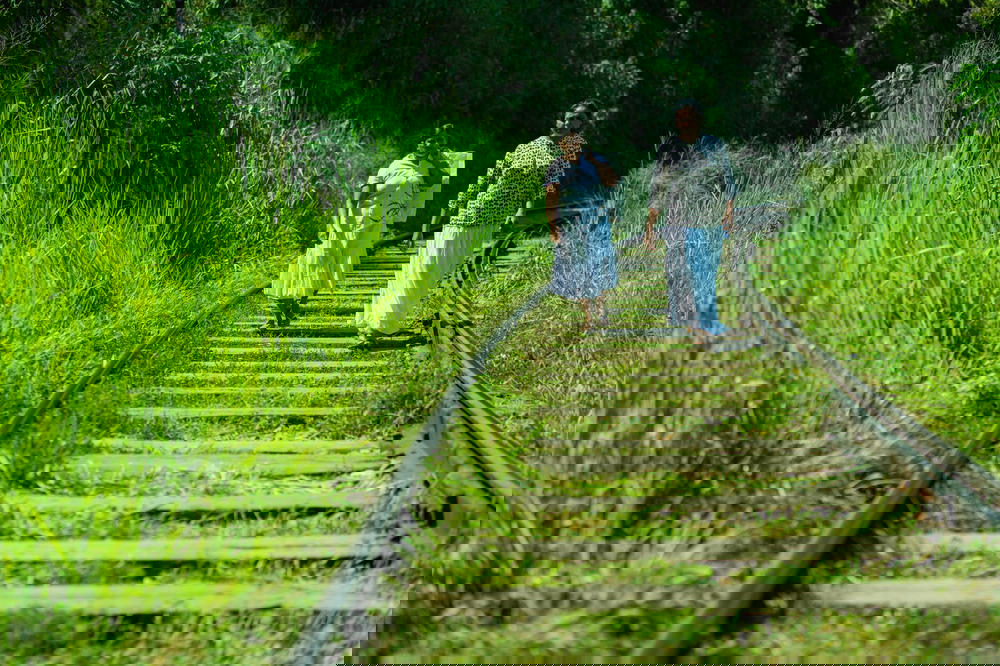 People walking on train tracks in Sri Lanka