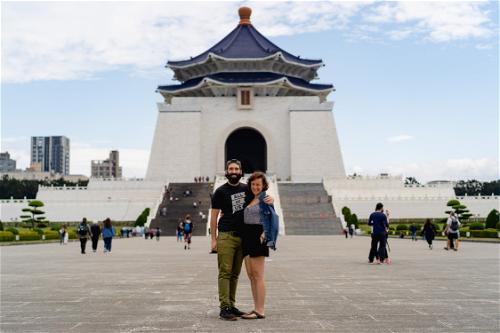 Couple smiling for a photo at Chiang Kai Shek Memorial Hall Plaza in Taipei