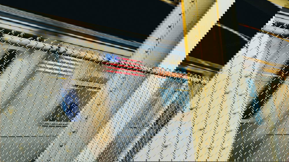 Train passing by in motion on the Manhattan Bridge