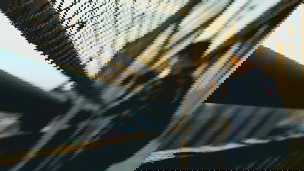 Out of focus person taking a photo on the Manhattan Bridge