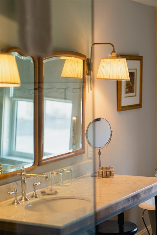 A bathroom in Pittsfield, Massachusetts featuring a mirror and sink.