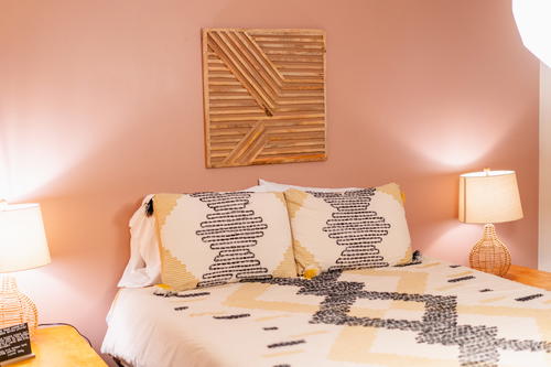 A pink-walled bedroom in the Catskills, New York.