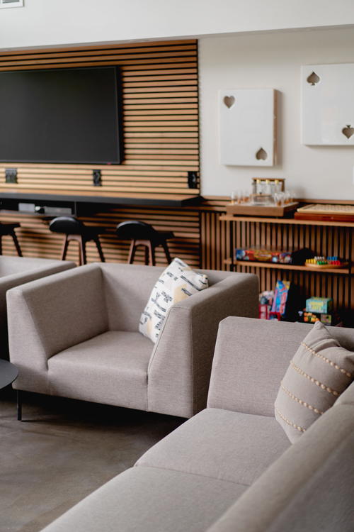 A living room with couches and a coffee table in Antrim Streamside, The Catskills, New York.
