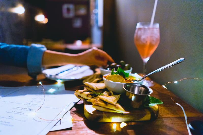 A plate of food and drinks on a table in Beacon, New York.