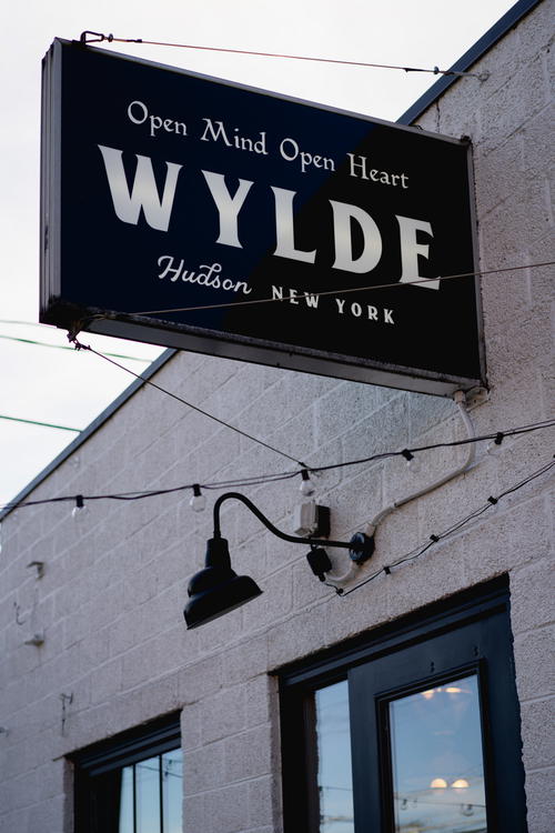 A Hudson sign promoting an open mind and open heart.