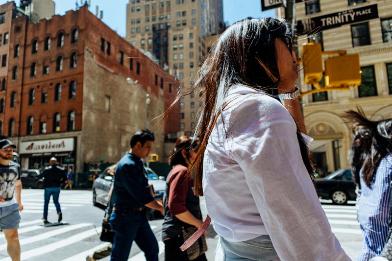 People walking on Trinity place in the Financial District