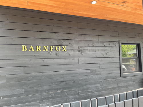 A building in Livingston Manor, New York with a sign that says barn fox.